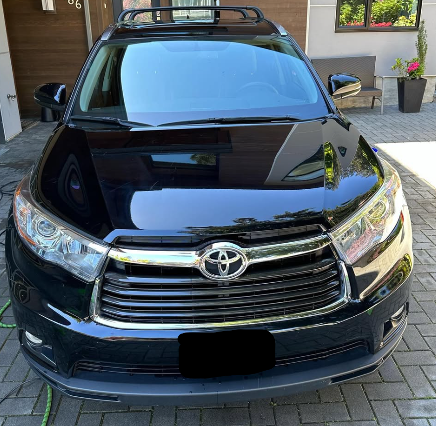 Glossy black Toyota after exterior detailing